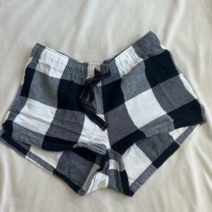 Black and white plaid pajama shorts.